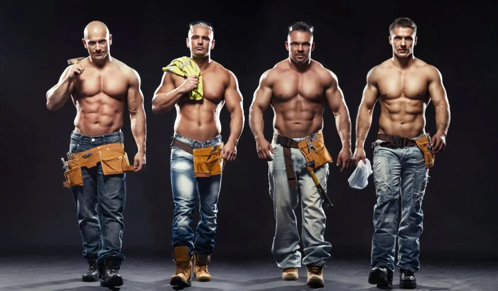 four male performers dressed as construction workers